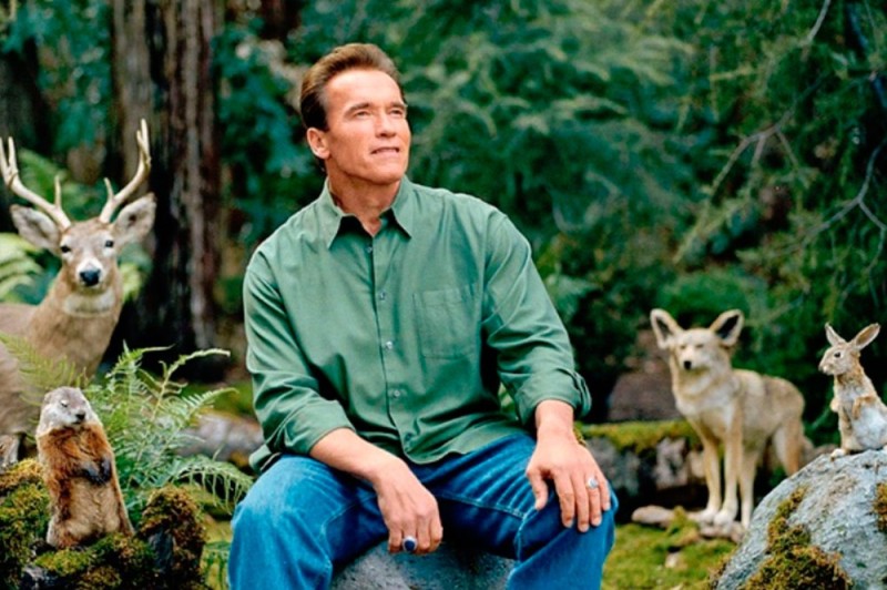 Create meme: attitude to nature, schwarzenegger in the forest with animals, Arnold Schwarzenegger in the woods