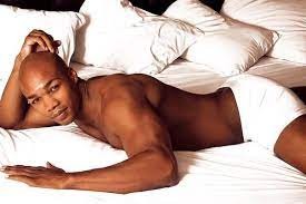 Create meme: a negro in bed, the negro is lying on the bed, beautiful black men