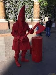 Create meme: The executioner, Omsk bird cosplay, the living statue