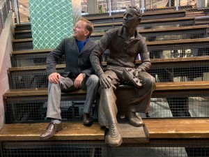 Create meme: male, the monument to Adolf Dassler, a monument to Roosevelt and Churchill on a bench in London