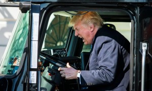Create meme: driving a truck, trump on the truck, Donald trump trucker