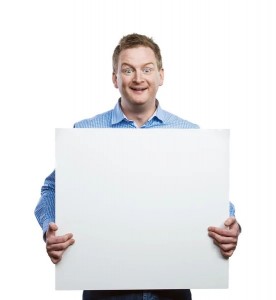 Create meme: a man holds a poster