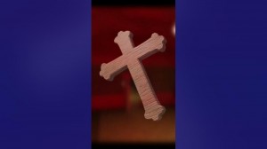 Создать мем: крест резной, нательный крестик, размытое изображение