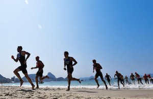 Create meme: polyanskiy triathlon, running pictures, man on the beach