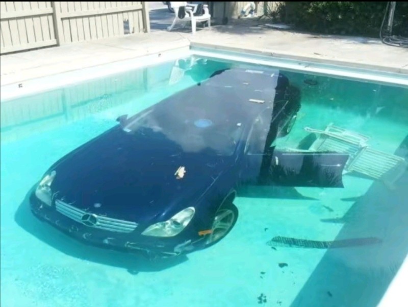 Create meme: a sunken car in the pool, the car is under water, pool machine