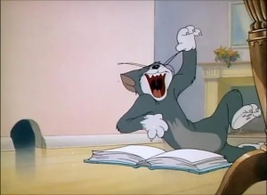 Create meme: cat, Tom laughs at the book, Tom and Jerry