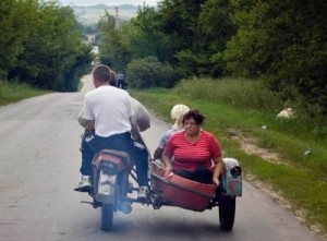 Создать мем: а еще, женщина за рулем, на дороге