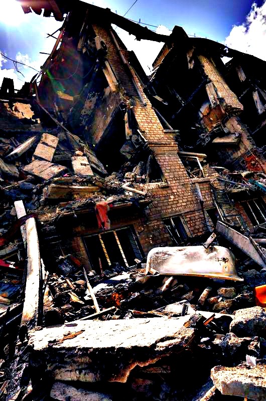 Create meme: mariupol 2022, explosion in the house, the destroyed house