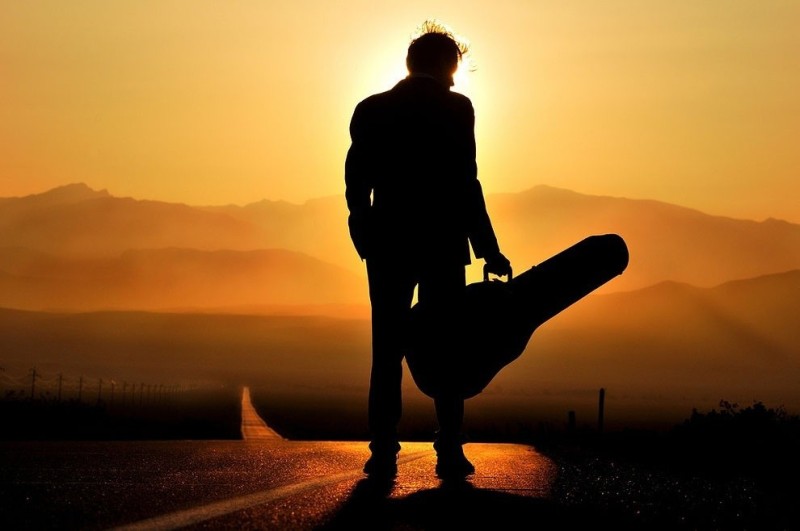 Create meme: philosophy of the soul, sunset , a man with a guitar at sunset