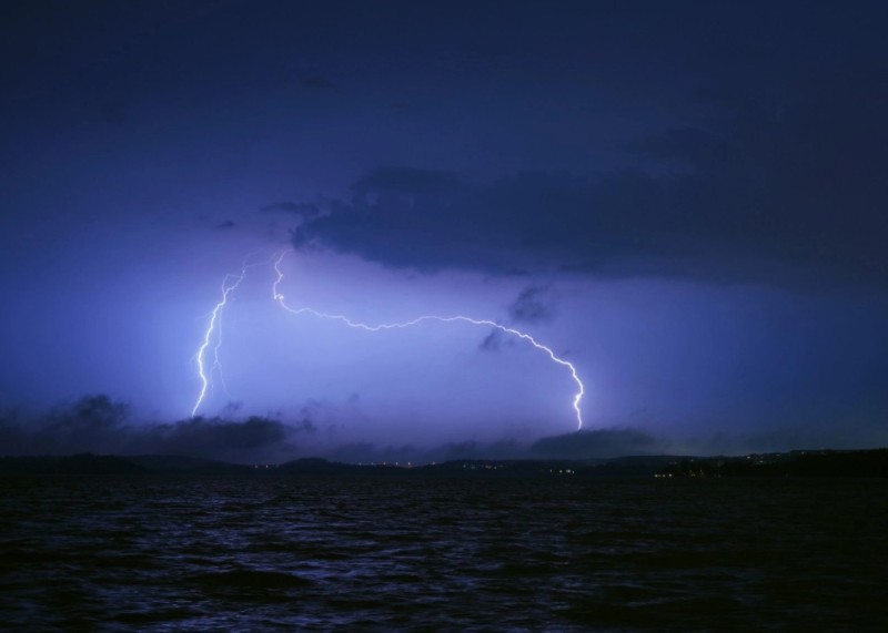 Create meme: lightning storm, nature , lightning in the sea