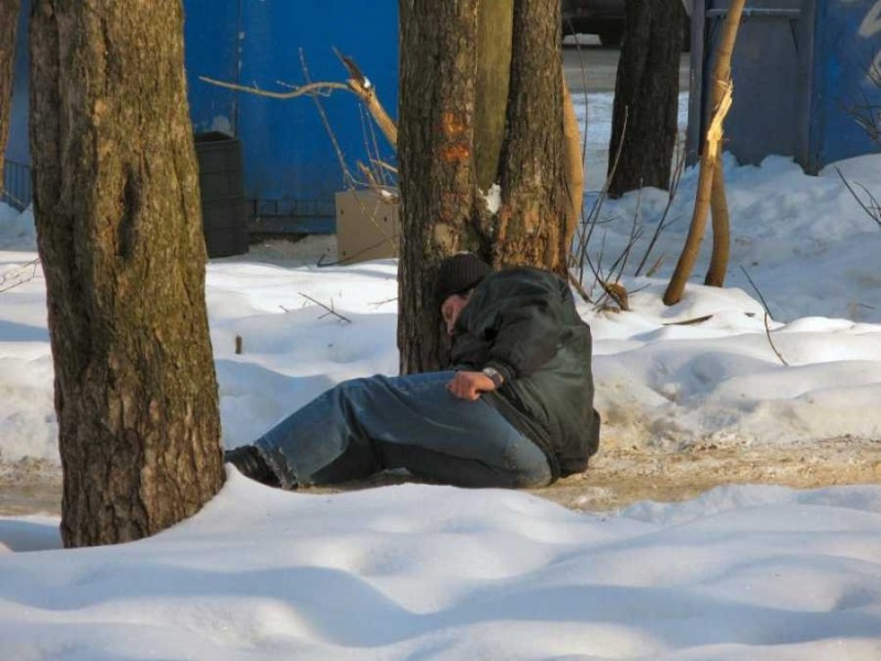 Create meme: the man lying on the snow, sleeping bums, the man in the snow