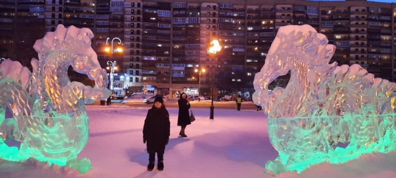 Create meme: girl , Ice town, ice sculptures in Perm 2019