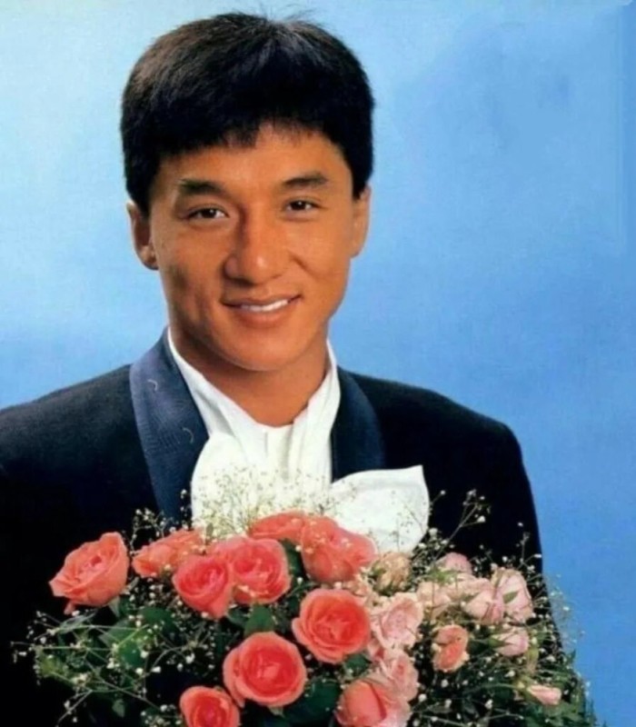 Create meme: Jackie Chan , jackie Chan with flowers, Young Jackie Chan with flowers
