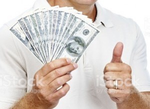 Create meme: dollars in the hands of, businessman holding wads of money, money in the hands of