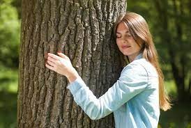 Create meme: a girl hugs a tree, hugs a tree, tree 