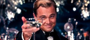 Create meme: the great Gatsby with a glass of, Leonardo DiCaprio raises a glass, DiCaprio with a glass of