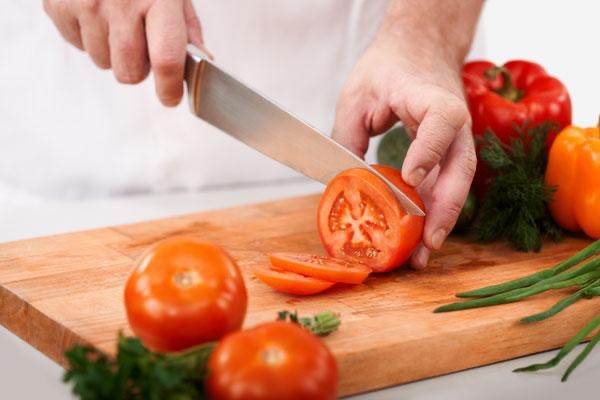 Create meme: sliced tomato, cutting vegetables on a cutting board, tomato slicer