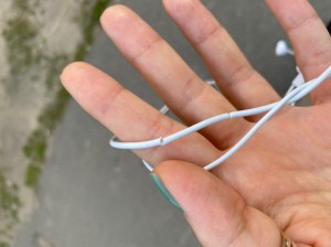 Create meme: Hand, earpods, earpods with lightning connector