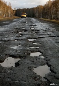 Create meme: pictures of bad roads, bad roads in Omsk, Russian roads