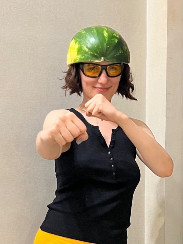 Create meme: young woman, occupational , watermelon helmet