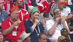 Create meme: in the headdress, match Russia Spain, fans in the headdress