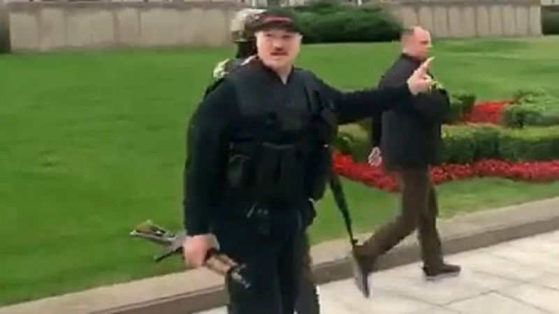 Create meme: Lukashenka with a machine gun and in a bulletproof vest, Lukashenko with a machine gun, Alexander Lukashenko 