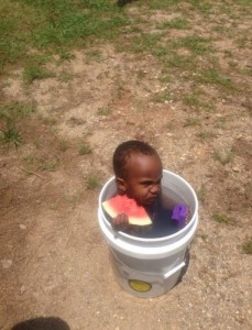Create meme: afrika, bucket, The small watermelon in the bucket