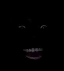Create meme: black background , ebony smiles in the dark, Negro laughing in the dark