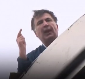 Создать мем: Саакашвили на крыше