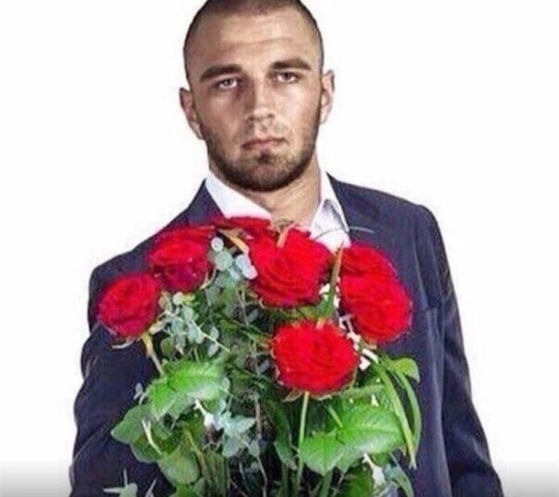 Create meme: the guy with the flowers, a man with a bouquet of flowers, a man with flowers in his hands