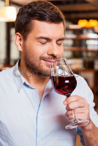 Create meme: a man with a glass, a man holds a glass, wine tasting