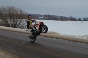 Create meme: wheelie, stunt, motorcycle