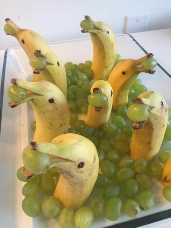 Create meme: fruit decorations, crafts from fruits and vegetables, banana dolphin fruit slicing