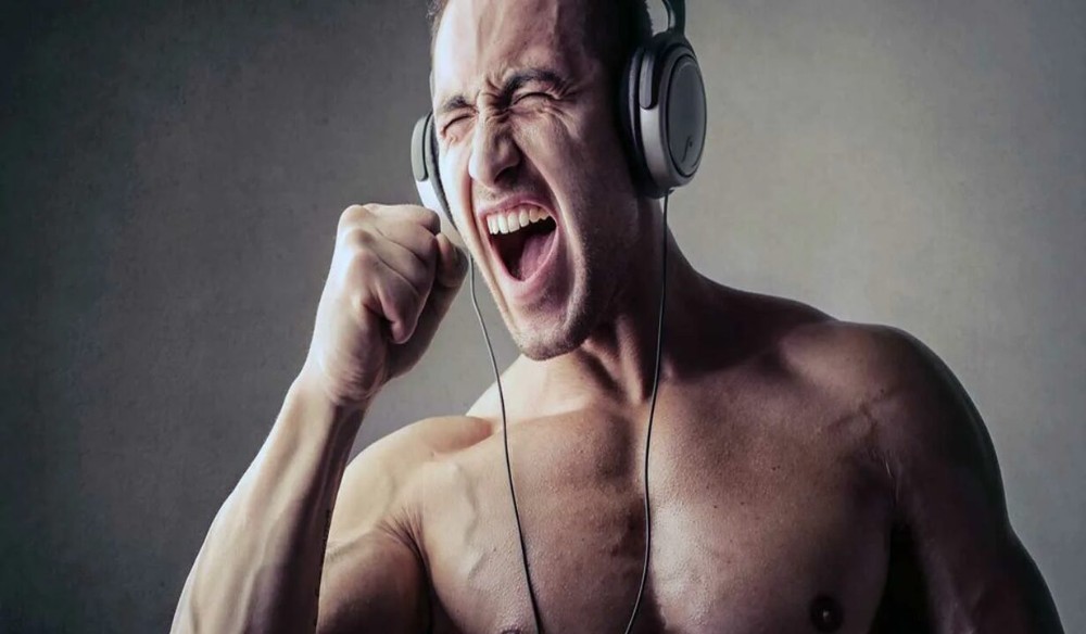 Create meme: The man with the headphones, I'm listening to music, workout music
