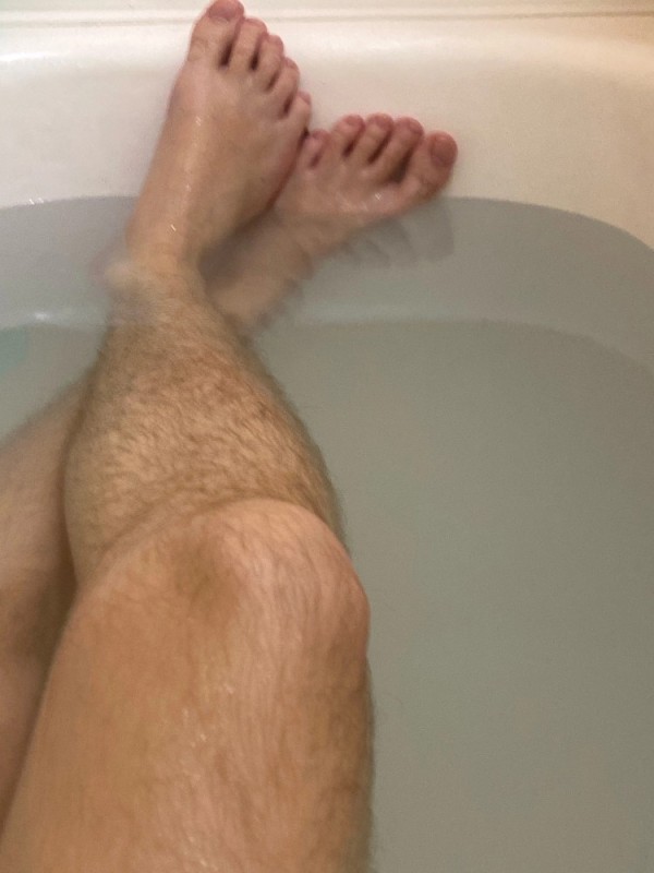 Create meme: men's feet in the bathroom, guys' legs, people 