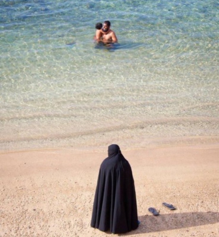 Create meme: I'm swimming for the last time, a Muslim woman at sea, a girl in a hijab