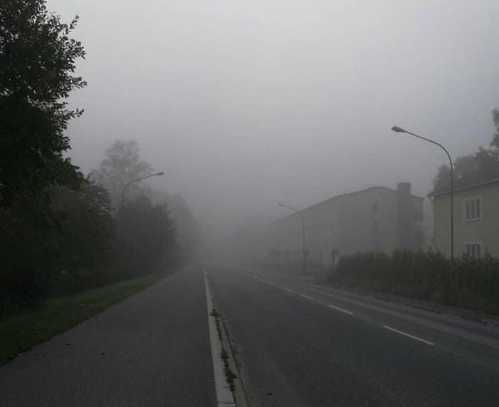 Create meme: in the fog, road , the city is in a fog