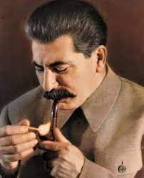 Create meme: Stalin smokes, Joseph Stalin, Stalin smokes a pipe