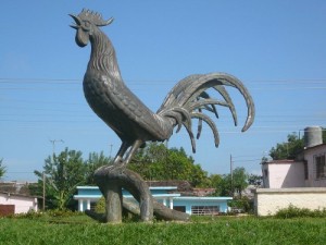 Create meme: rooster, a monument to cock, moron