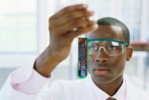 Create meme: the negro scientist, a negro with a test tube, sharldegol just original