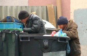 Create meme: bum digging in the trash, homeless in a dumpster