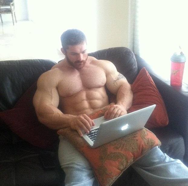 Create meme: Jock with laptop MEM, a wrestler with a laptop, Jock with a laptop