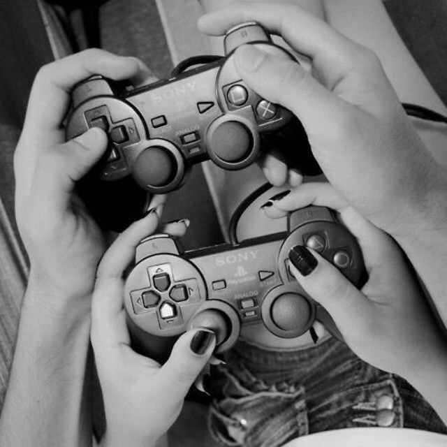 Create meme: A guy and a girl are playing a video game console, ps4 gamepad, A couple is playing a video game console