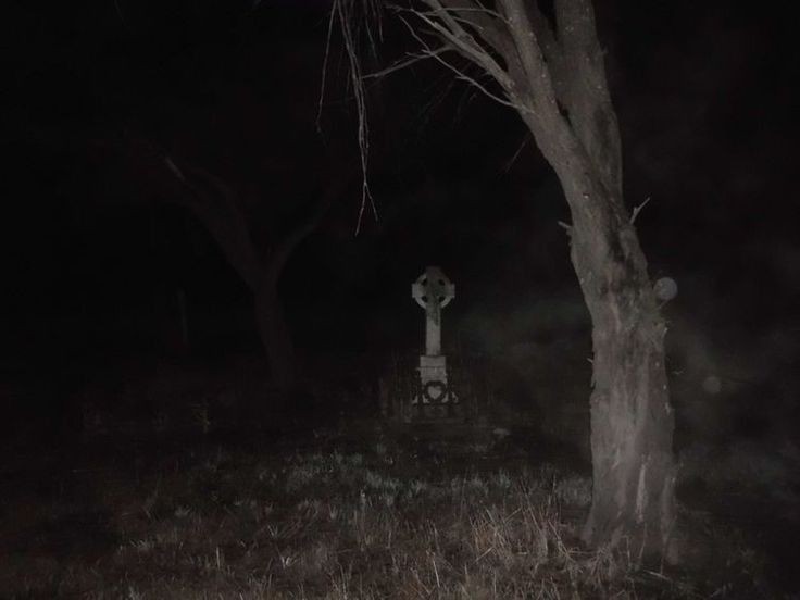 Create meme: cemetery at night, the ghost in the cemetery, darkness