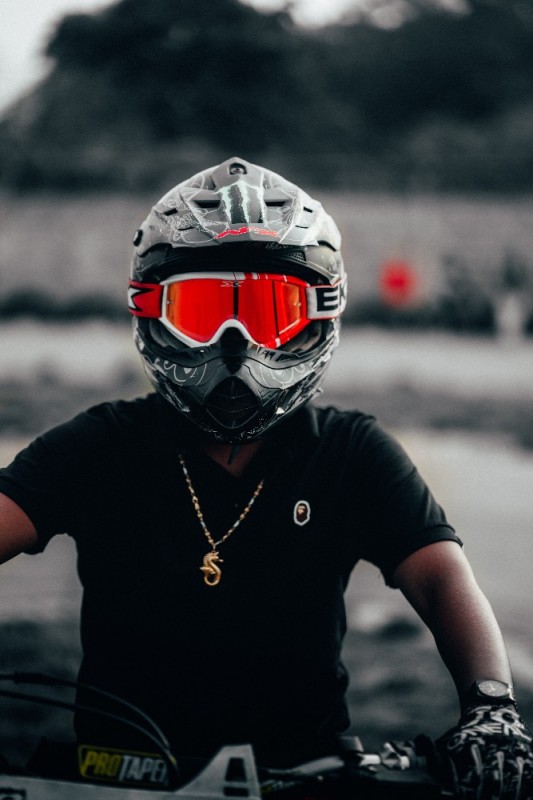Create meme: motorcycle helmet, A motorcyclist in a helmet with a cigarette, helmet for motorcycle 