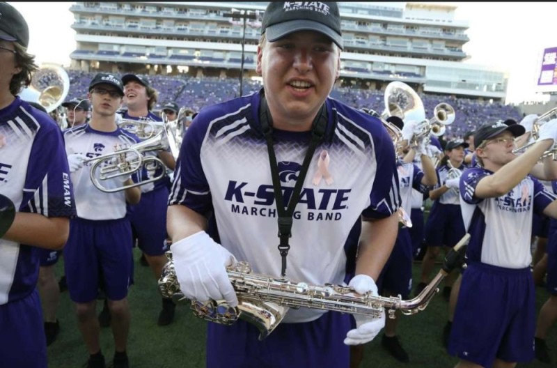 Create meme: guy , kansas state university marching band, american football