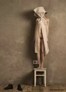 Create meme: a woman stands on a stool photos