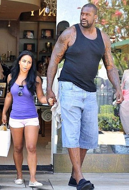 Create meme: big guy and little girl, Nicole Alexander and Shaquille o'neal, a tall man and a small woman