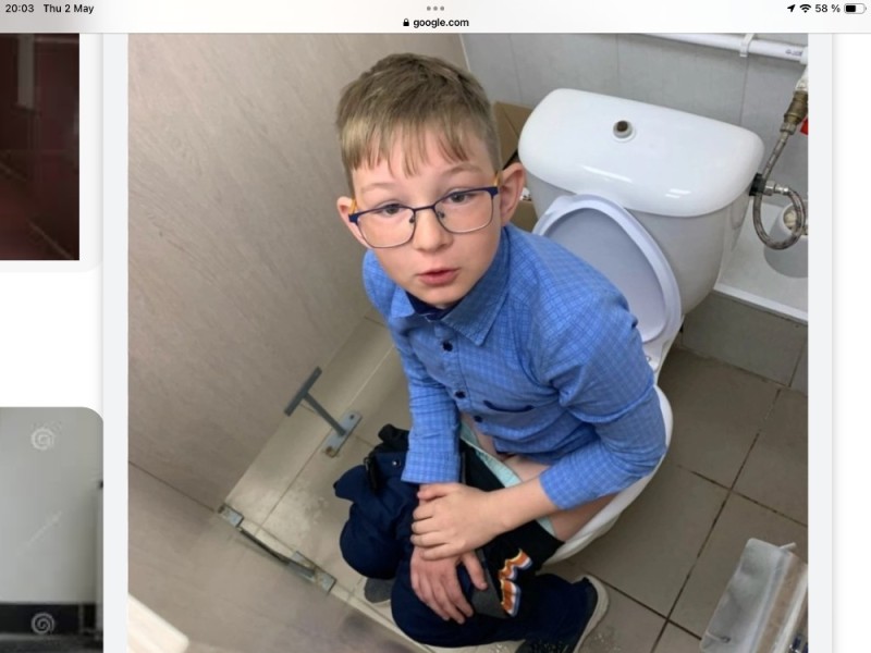 Create meme: The boy is sitting in the toilet, toilet boy, boy 