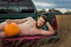Create meme: photo shoot of a man with pumpkins, the man with the pumpkin, funny men